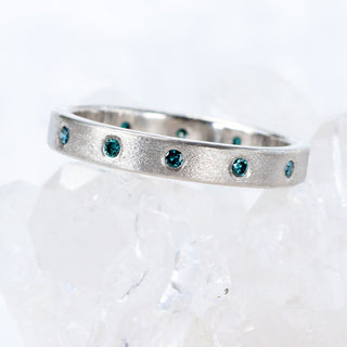 Custom Teal Blue Diamond Eternity Ring in 950 Platinum