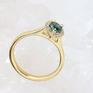 Custom Teal Sapphire and Diamond Halo Engagement Ring in 18ct Gold