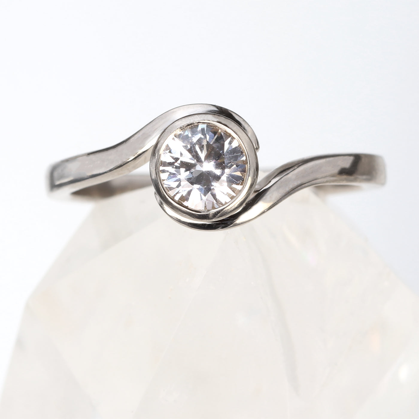 white sapphire swirl ring