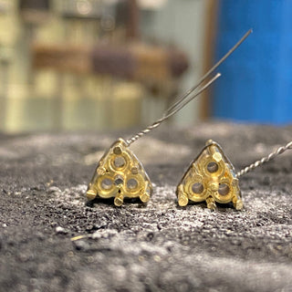 Bespoke engagement ring cluster setting with oval yellow sapphire and diamonds, handmade UK.