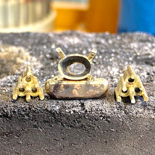 Luxury bespoke sapphire and diamond cluster engagement ring, handmade in Cornwall workshop.